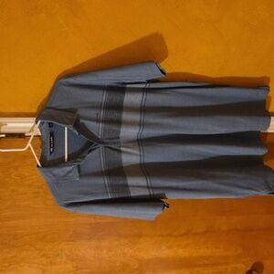 Travis Mathew Light Blue Polo Shirt for Men